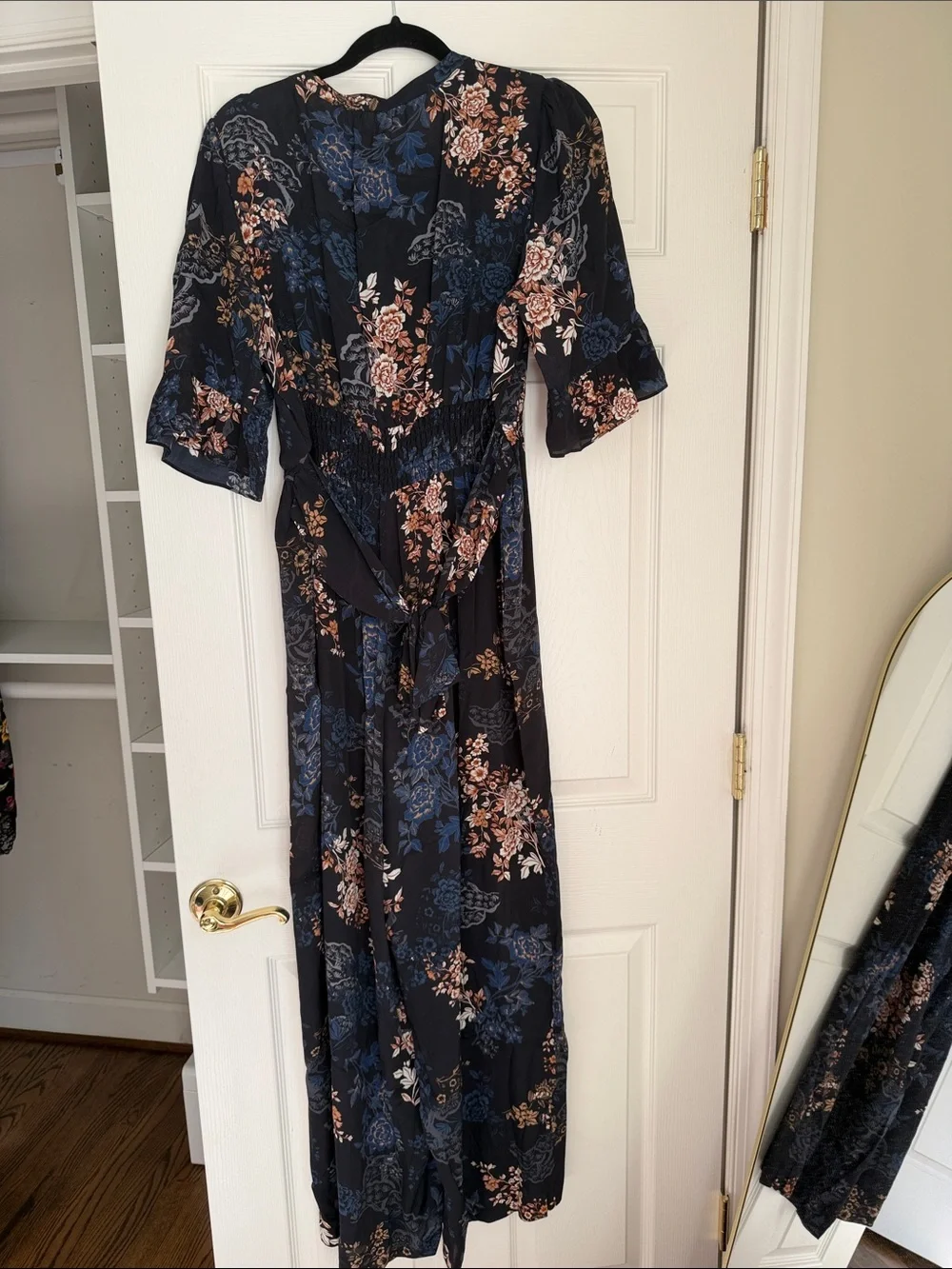 Anthropologie Navy Floral Tie-Neck Jumpsuit with Blush Accents